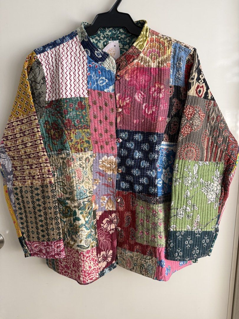 Reversible Quilted Patchwork Jacket (Category: Coats, Jackets and Outerwear) located in Las Pinas. Submitted by katrt (Listing ID 1470597962, Image 1). Description: - Condition: Brand new with tag attached - Size: L (Made in India) - Material: 100% cotton - Design: Reversible (Colorful patchwork print on side one, turquoise floral pattern on side other) - Features: Front button closure with looped fastenings and two front pockets on the patchwork