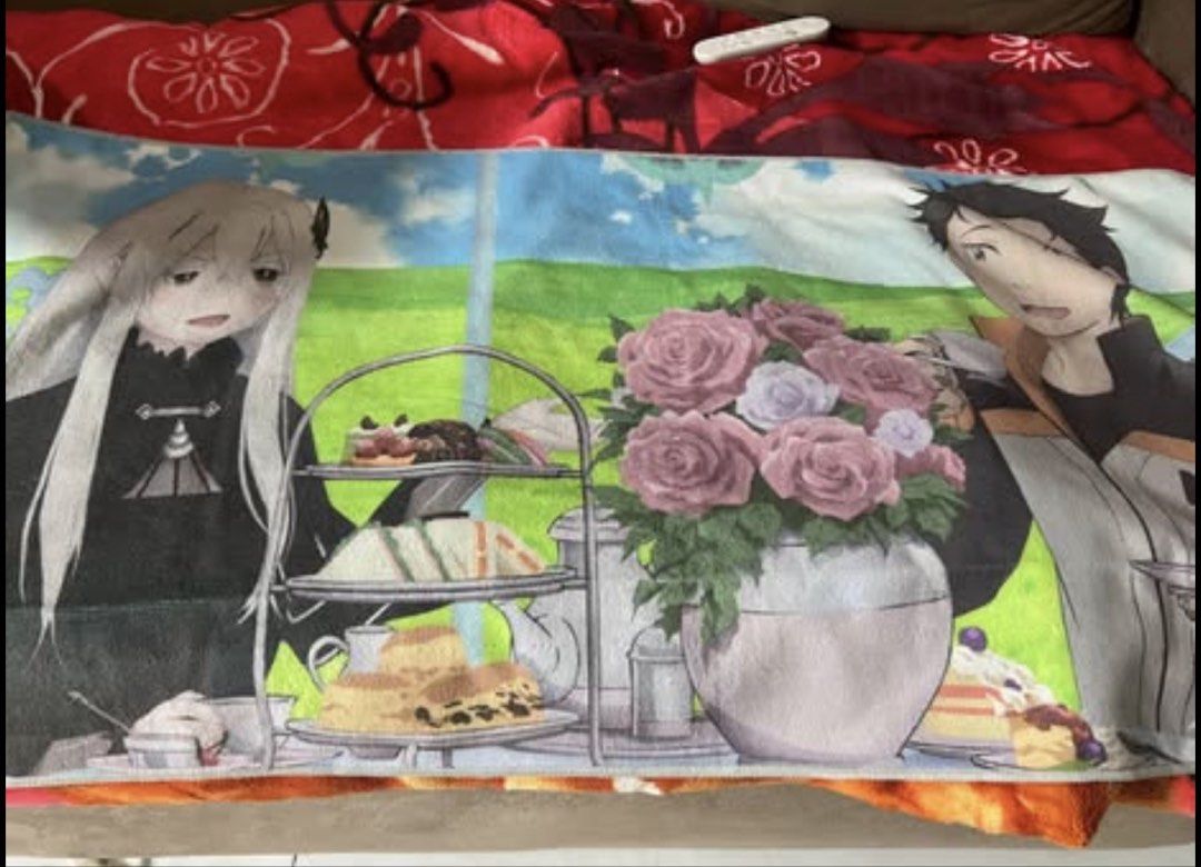 Re:Zero Echidna and Subaru Tea Party Towel (Category: Bedding & Towels) located in Manila. Submitted by memchonut (Listing ID 1470598327, Image 1). Description: - Official Re:Zero fleece blanket featuring Echidna, Subaru, and the iconic tea party setup with pastries and roses • Used lightly before! But is washed • 50cm x 100cm 🚘Loc: Tunasan Muntinlupa 💌 MOP: Gcash only 🚚 MOD: J&T, Lalamove.