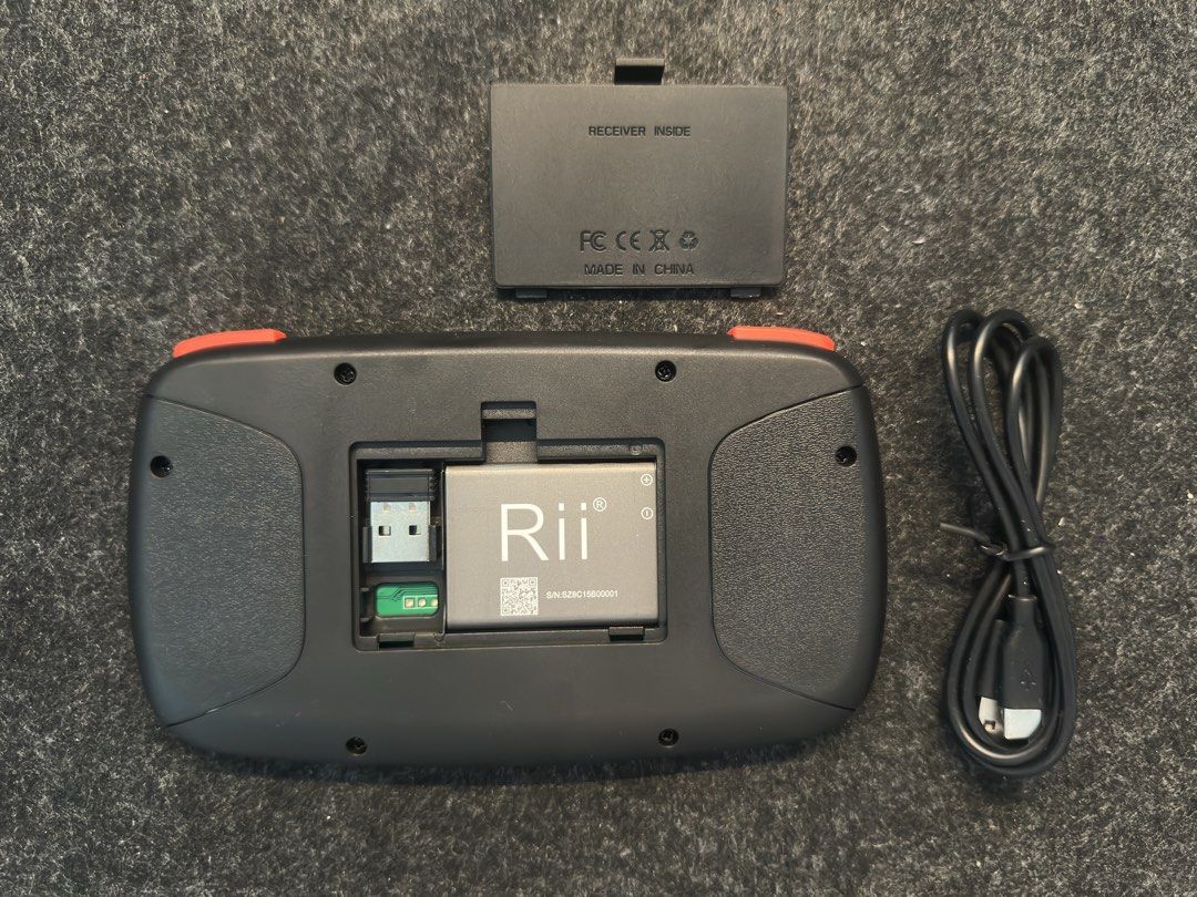 Rii i4 Mini Keyboard (Category: Computer Keyboard) located in Taguig. Submitted by xylieavalon (Listing ID 1470735062, Image 2). Description: - Dual-mode connectivity: Connect via Bluetooth or 2.4GHz USB receiver - Compact handheld design in sleek black with backlit keys for easy night use - Built-in rechargeable battery (removable cover at the back) - Comes complete with charging cable, user manual, and original box - Perfect for smart TVs, PC, 