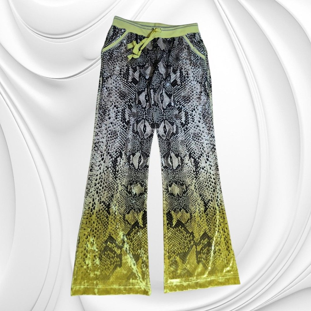 Roberto Cavalli Gym Python Print Track Pants Yellow (Category: Activewear) located in Paranaque City. Submitted by calm_youngstore7 (Listing ID 1470620646, Image 2). Description: LAST PIECE SALE! 80% OFF RETAIL - Brand: Roberto Cavalli - Condition: Brand new with original store tags attached - Design: All-over python snakeskin pattern with a neon yellow ombré gradient towards the bottom - Waistband: Chartreuse yellow elastic with metallic silver 