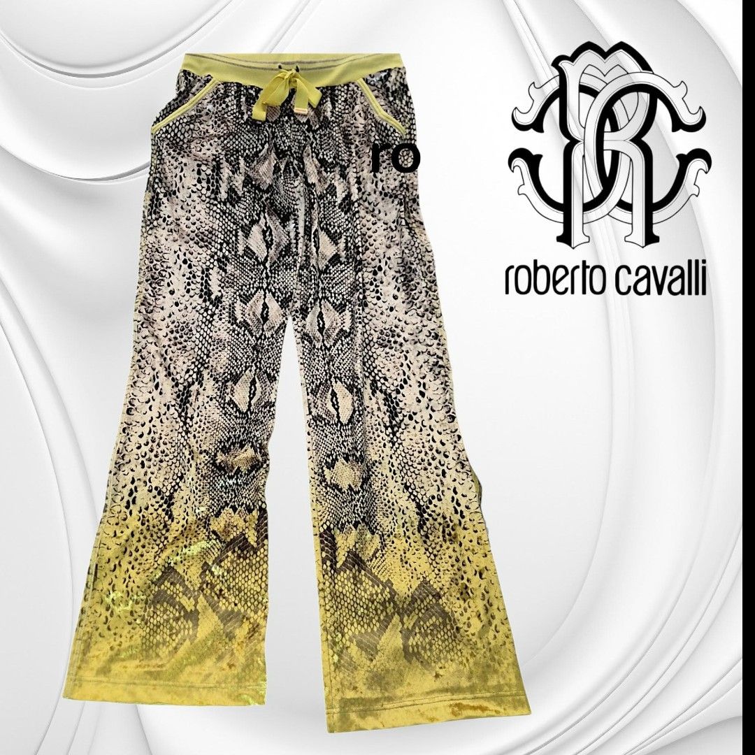Roberto Cavalli Gym Python Print Track Pants Yellow (Category: Activewear) located in Paranaque City. Submitted by calm_youngstore7 (Listing ID 1470620646, Image 1). Description: LAST PIECE SALE! 80% OFF RETAIL - Brand: Roberto Cavalli - Condition: Brand new with original store tags attached - Design: All-over python snakeskin pattern with a neon yellow ombré gradient towards the bottom - Waistband: Chartreuse yellow elastic with metallic silver 