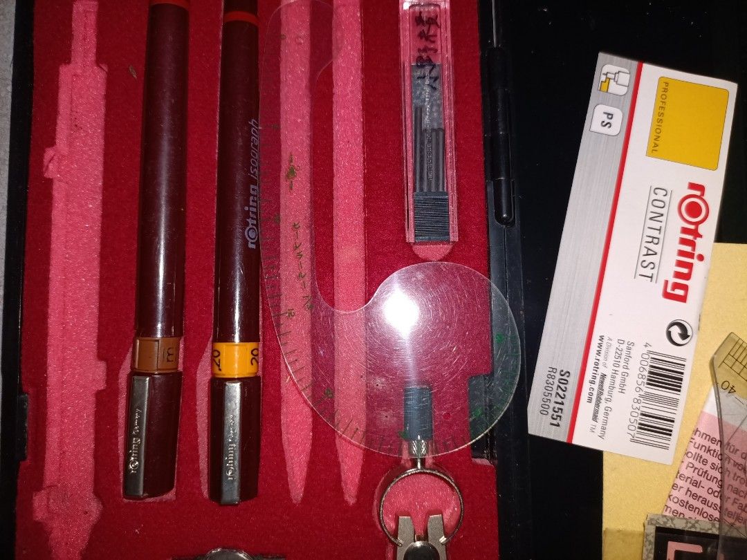 Rotring Isograph Drafting Set Technical Pen Mechanical Pencil Compass (Category: Stationery & School Supplies) located in Taguig. Submitted by grandfish_55ab5c (Listing ID 1470570858, Image 2). Description: - Authentic Rotring Isograph technical pen set in a fitted case - Includes two pens with nib sizes 0.20 and 0.50 - Comes with a mechanical compass and spare leads - Includes drafting templates, rulers, and a protractor - Red velvet interior li