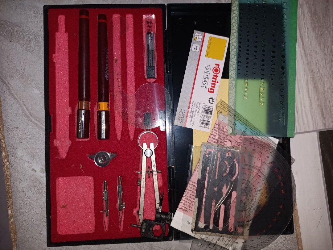 Rotring Isograph Drafting Set Technical Pen Mechanical Pencil Compass (Category: Stationery & School Supplies) located in Taguig. Submitted by grandfish_55ab5c (Listing ID 1470570858, Image 1). Description: - Authentic Rotring Isograph technical pen set in a fitted case - Includes two pens with nib sizes 0.20 and 0.50 - Comes with a mechanical compass and spare leads - Includes drafting templates, rulers, and a protractor - Red velvet interior li