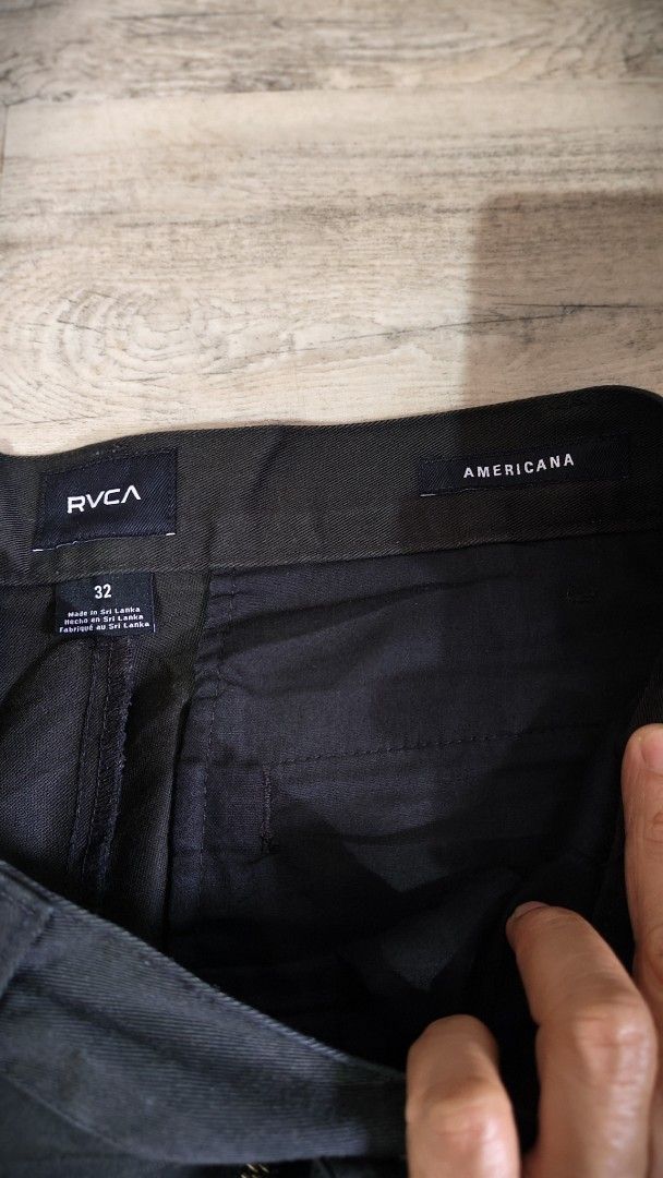 RVCA Americana Black Shorts Size 32 (Category: Shorts) located in Quezon City. Submitted by truedeer_cda94c (Listing ID 1470602449, Image 3). Description: - Brand: RVCA (Americana Style) - Color: Black - Size: 32 Waist - Material/Origin: Made in Sri Lanka - Features: Classic chino style, button closure, zip fly - Pockets: Dual front pockets, coin pocket with embroidered logo, dual welt back pockets with RVCA tag - Condition: Clean, solid pair, re