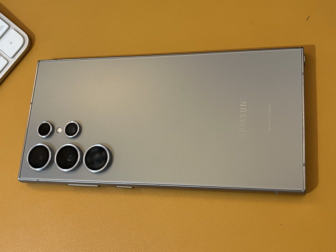 S24Ultra 256GB Openline (Category: Samsung) located in Cavite. Submitted by mckvrmmcdx (Listing ID 1470735505, Image 1). Description: - Model: Samsung Galaxy S24 Ultra - Storage: 256GB - Network: Openline (all networks supported) - Color: Titanium Gray - Condition: Good working order with minor visible wear on frame edges - Included: Original Box, Charger - Meetup Location: SM City Tanza, Cavite.