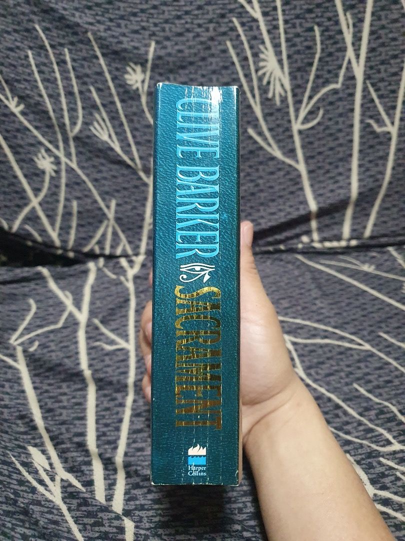Sacrament by Clive Barker (Category: Storybooks) located in Bulacan. Submitted by anthony_b01 (Listing ID 1470604273, Image 2). Description: - Sacrament by Clive Barker - Mass Market Paperback - 30 pesos only Rfs: Decluttering space Location: SJDM, Bulacan Courier: Lalamove or J&T delivery.