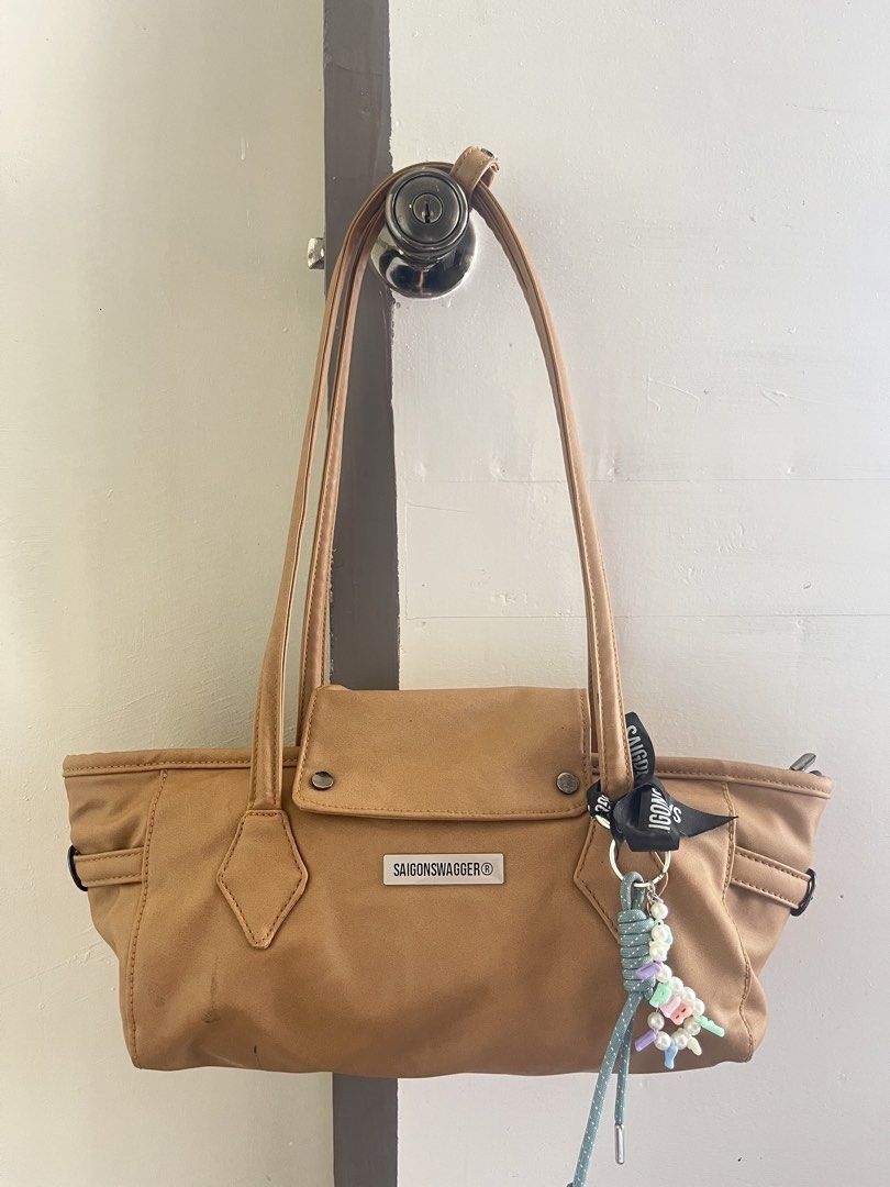 Saigonswagger Brown Shoulder Bag (Category: Shoulder Bags) located in General Santos City (Dadiangas). Submitted by mschic309 (Listing ID 1470664486, Image 1). Description: - light brown in color - 9/10 condition - mop: gcash - mod: j&t.