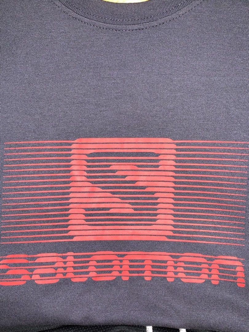 Salomon Graphic Tee Dark Grey Size L (Category: Tshirts & Polo Shirts ) located in Manila. Submitted by consencino97571 (Listing ID 1470712366, Image 3). Description: - Brand: Salomon - Color: Dark grey with bold red striped chest logo - Size: Large (tag on collar) - Material: Soft cotton, regular fit - Origin: Made in Tunisia - Condition: Clean piece with print completely intact.