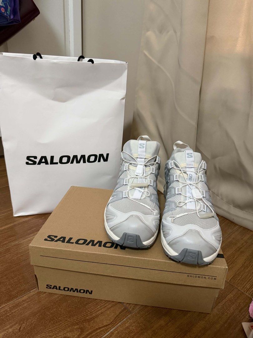 Salomon XA Pro 3D White Silver Sneakers (Category: Sneakers) located in Batangas. Submitted by luckybear77 (Listing ID 1470629450, Image 1). Description: - Model: Salomon XA Pro 3D - Color: White and Silver - Closure: Quicklace system for fast wear - Comfort & Grip: Breathable mesh upper with chunky sole and 3D chassis tech - Inclusions: Original box and matching Salomon paper bag - Condition: Brand new / Like new (Ready to ship).
