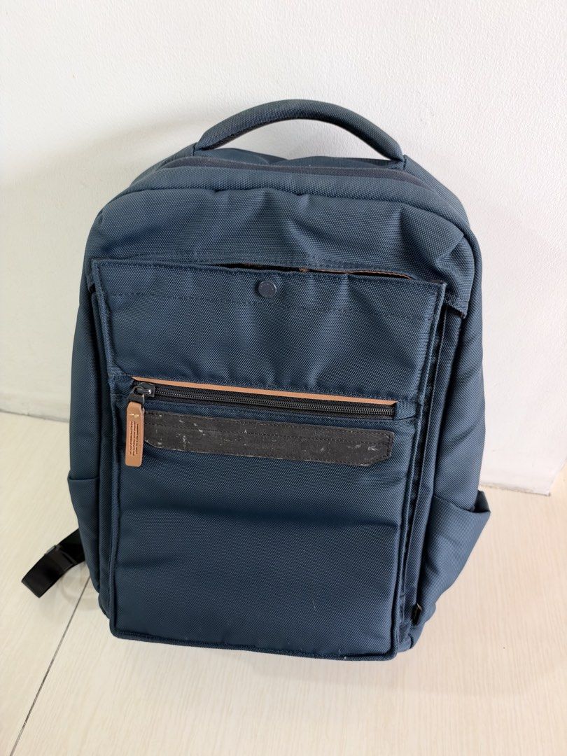 Samsonite Red Anti-Bacterial Laptop Backpack (Category: Backpacks) located in Quezon City. Submitted by dlsy12 (Listing ID 1470567659, Image 1). Description: - Authentic Samsonite Red backpack in sleek dark blue - Clean brown interior featuring an anti-bacterial treatment tag - Multiple zippered compartments, mesh slip pockets, and built-in pen holders - Front zip pocket accented with a stylish dark textured panel - Comfortable padded top handle 