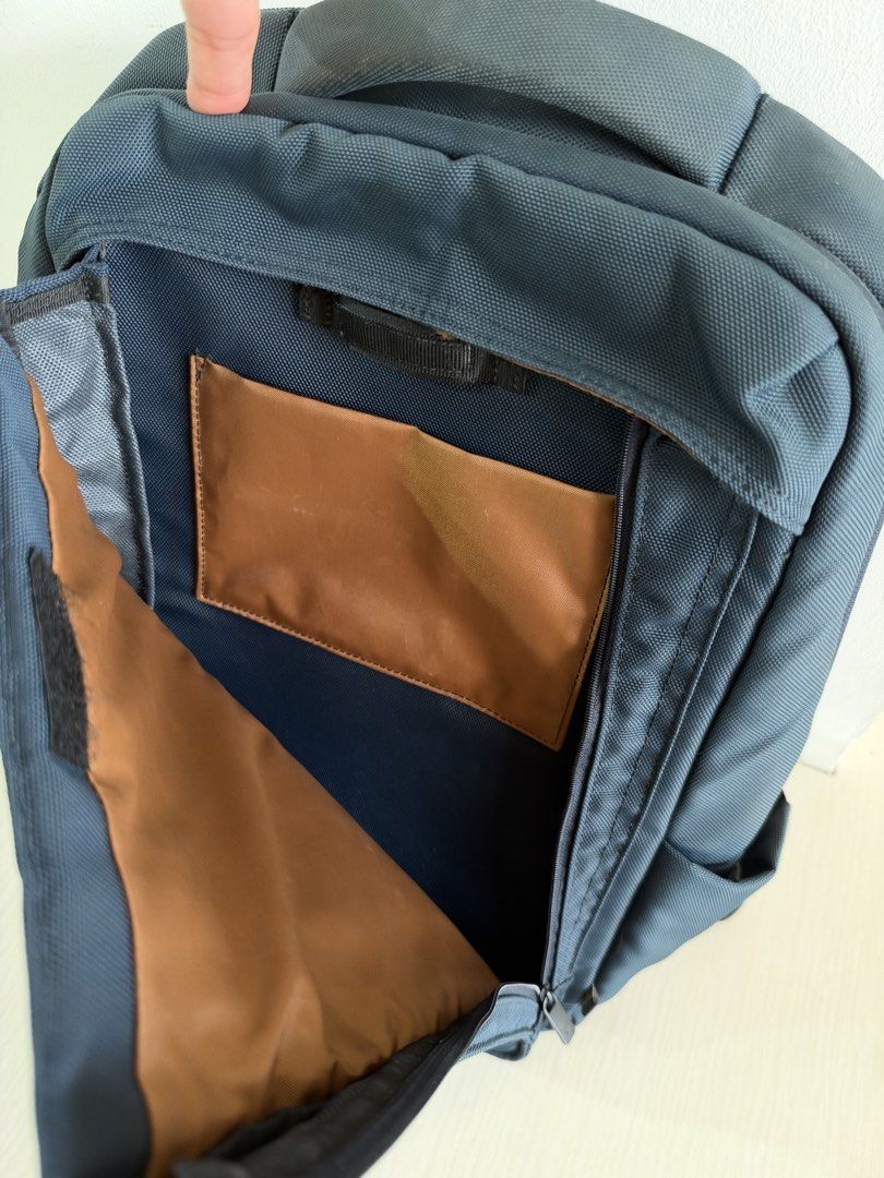 Samsonite Red Anti-Bacterial Laptop Backpack (Category: Backpacks) located in Quezon City. Submitted by dlsy12 (Listing ID 1470567659, Image 2). Description: - Authentic Samsonite Red backpack in sleek dark blue - Clean brown interior featuring an anti-bacterial treatment tag - Multiple zippered compartments, mesh slip pockets, and built-in pen holders - Front zip pocket accented with a stylish dark textured panel - Comfortable padded top handle 