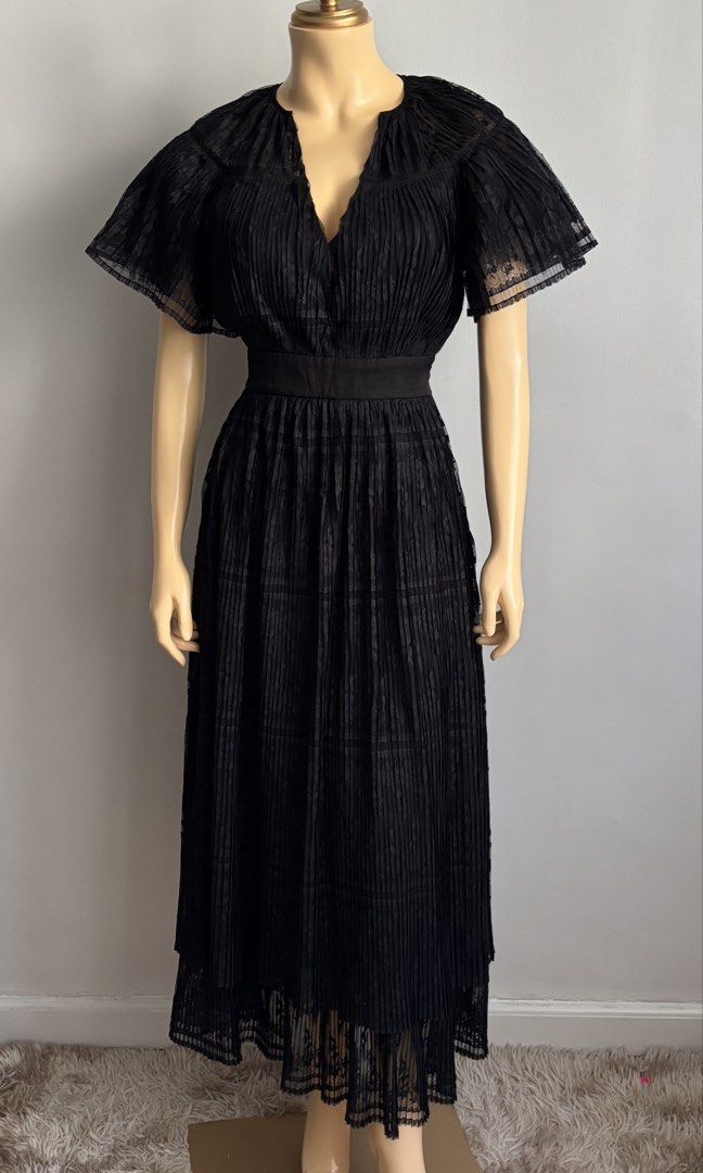Sandro long pleated lace dress (Category: Dresses) located in Quezon City. Submitted by swift_kenjie (Listing ID 1470563195, Image 2). Description: 🖤 SANDRO PARIS — ELEGANT BLACK DRESS 🖤 French designer elegance at its finest! ✨ Gorgeous pleated details, sheer flutter sleeves, and a flattering waistline for that classy, sophisticated look. Perfect for parties, date nights, dinners, and special occasions. 🥂 🏷️ Brand: Sandro Paris 📏 Size on ta