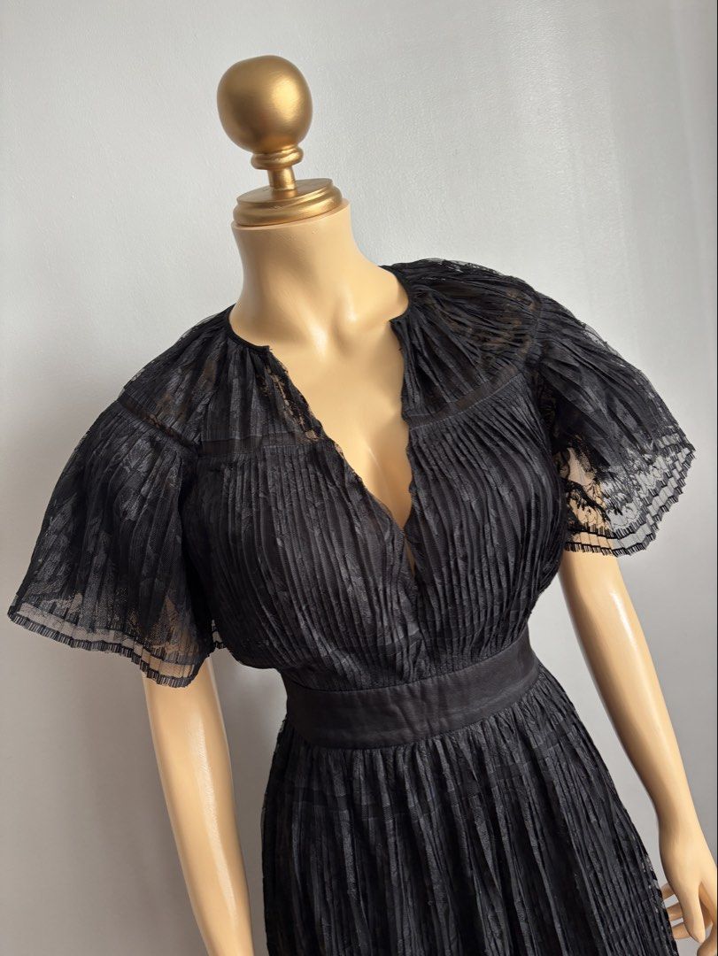 Sandro long pleated lace dress (Category: Dresses) located in Quezon City. Submitted by swift_kenjie (Listing ID 1470563195, Image 3). Description: 🖤 SANDRO PARIS — ELEGANT BLACK DRESS 🖤 French designer elegance at its finest! ✨ Gorgeous pleated details, sheer flutter sleeves, and a flattering waistline for that classy, sophisticated look. Perfect for parties, date nights, dinners, and special occasions. 🥂 🏷️ Brand: Sandro Paris 📏 Size on ta