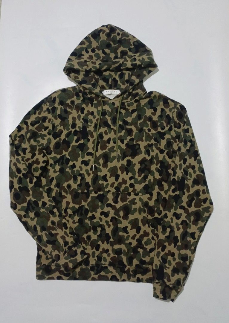 Sandro Paris Camouflage Pullover Hooded Jacket (Category: Luxury Apparel) located in Bacolod City. Submitted by luxtrend.ph (Listing ID 1470705091, Image 2). Description: Sandr0 Par¡$ Camouflage PullOver Hooded Jacket •Photos may vary due to lighting✨ •For Men •Size: Medium on tag •Measurements: 21W / 26.5L •Condition: Excellent •Issues: None •Color Rate: 9.5/10 •Complete tags •Tight Ribbings •₱rice: 2,280 shipped🏷 DM to purchase🛒🛒🛒 Courier: 