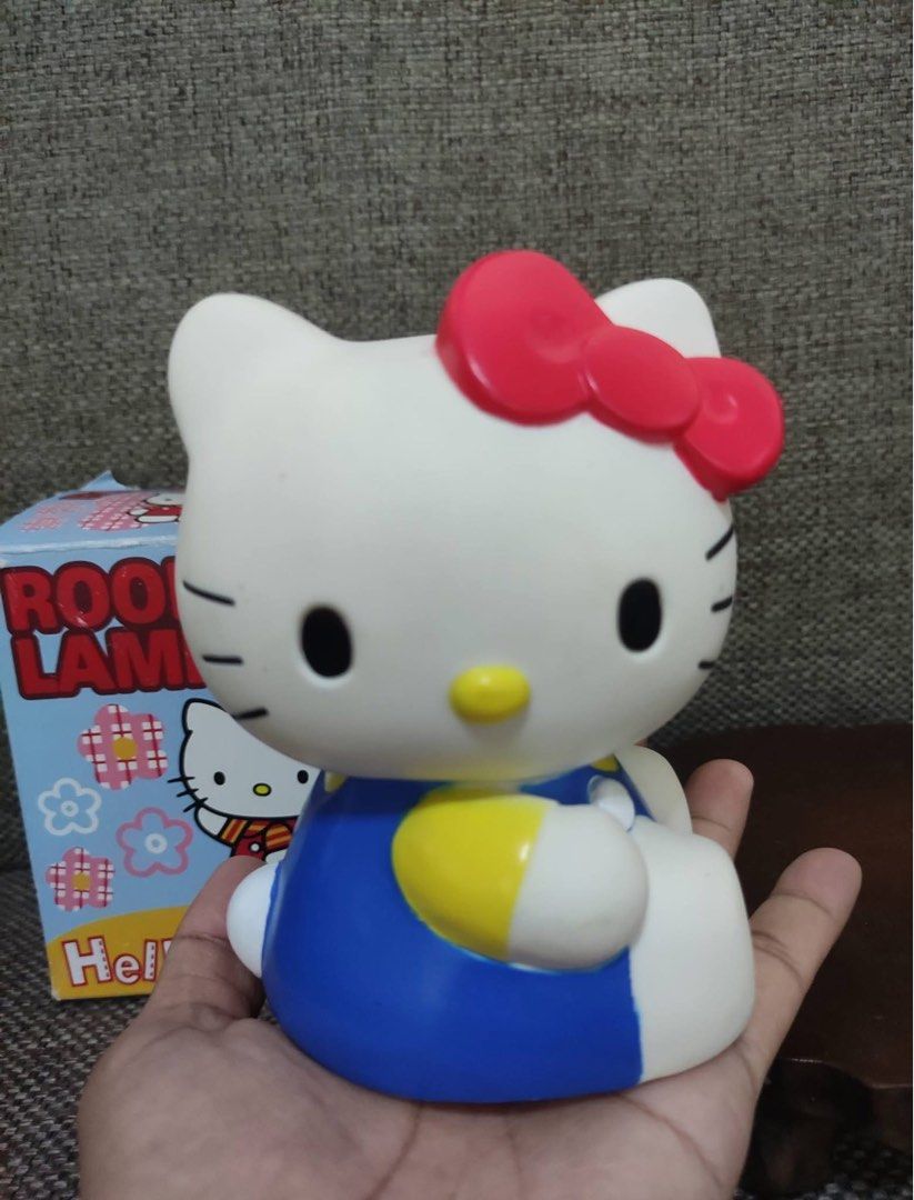 Sanrio Hello Kitty Room Lamp Night Light (Category: Lighting) located in Manila. Submitted by janetecson05 (Listing ID 1470601034, Image 3). Description: - Vintage 1997 Sanrio Kitty room lamp - Emits a cozy, warm glow when switched on - Includes original packaging box - Stamped with official Sanrio markings on the bottom base - Battery-operated (runs on 2 AAA batteries, already included).