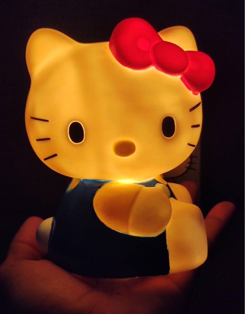 Sanrio Hello Kitty Room Lamp Night Light (Category: Lighting) located in Manila. Submitted by janetecson05 (Listing ID 1470601034, Image 2). Description: - Vintage 1997 Sanrio Kitty room lamp - Emits a cozy, warm glow when switched on - Includes original packaging box - Stamped with official Sanrio markings on the bottom base - Battery-operated (runs on 2 AAA batteries, already included).