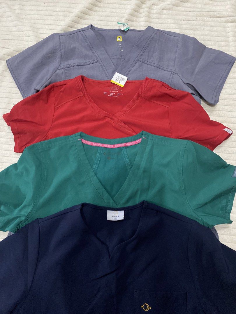 Scrub top womens xs (Category: Activewear) located in Tanza. Submitted by 9th.street.thrift (Listing ID 1470597341, Image 2). Description: Scrub top womens Good as new No issue All xs on tag 18x25.5 4 for 600+sf fixed price.