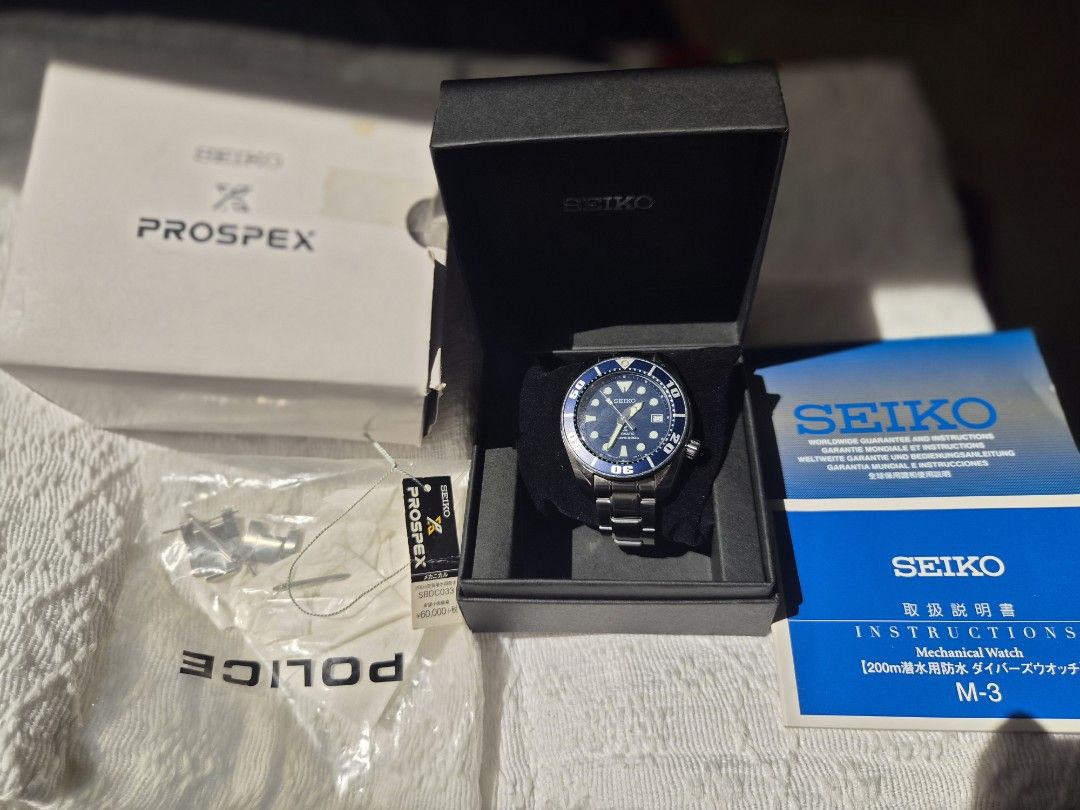 Seiko Prospex BluMo Sumo SBDC033 (Category: Men's Watches) located in Manila. Submitted by antalf (Listing ID 1470605206, Image 3). Description: - Model: Seiko Prospex SBDC033 Automatic Watch - Dial & Bezel: Stunning deep blue - Material: Stainless steel case and bracelet - Water Resistance: 200m (ideal for diving and daily wear) - Condition: Glass is clean; minor hairline scratches on the case and bracelet from normal wrist wear; keeps great tim