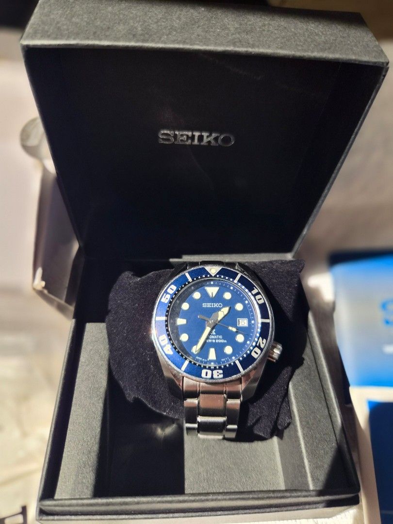 Seiko Prospex BluMo Sumo SBDC033 (Category: Men's Watches) located in Manila. Submitted by antalf (Listing ID 1470605206, Image 2). Description: - Model: Seiko Prospex SBDC033 Automatic Watch - Dial & Bezel: Stunning deep blue - Material: Stainless steel case and bracelet - Water Resistance: 200m (ideal for diving and daily wear) - Condition: Glass is clean; minor hairline scratches on the case and bracelet from normal wrist wear; keeps great tim