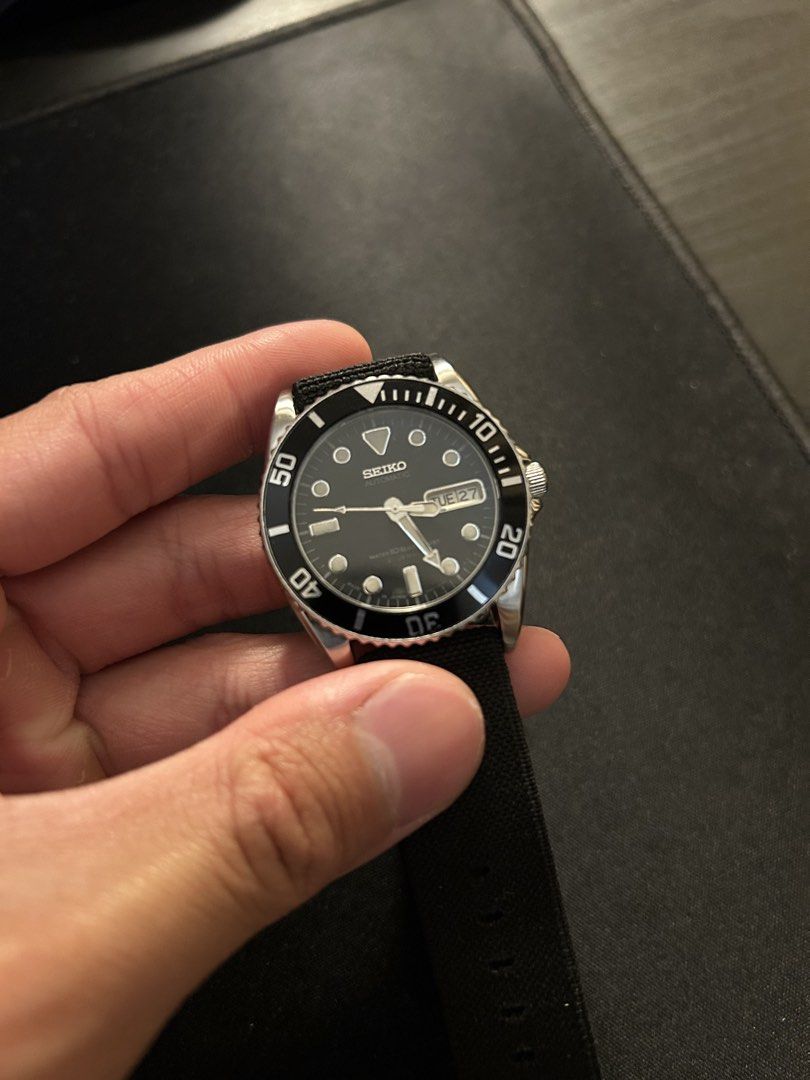 Seiko SKX023J Automatic Diver Watch (Category: Men's Watches) located in Santa Rosa. Submitted by marcaurelius (Listing ID 1470620374, Image 3). Description: Rare and discontinued Seiko Watch Movement: 7S26-0050 Case Size: 38mm Lug Width: 20mm Crown: Screw-down Watch Head: All Original except Bezel (AM) With aftermarket strap .