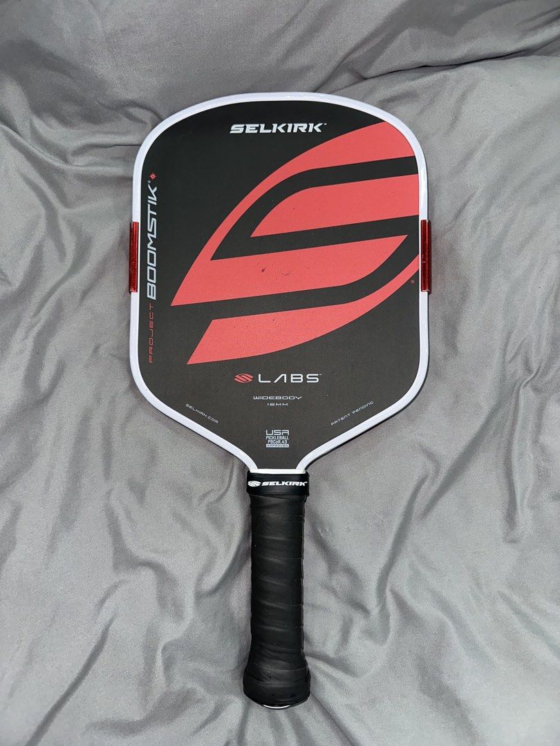 Selkirk Labs Project Boomstik Widebody (Category: Racket and Ball Sports) located in Plaridel. Submitted by popboxshop (Listing ID 1470604712, Image 1). Description: Selkirk Boomstil Widebody • NFC scannable • Bought last June 2026, still under the 6 mons warranty • With newly installed edge tape and overgrip Can send more detailed pics upon request Honest issue: • ball marks at sweet spot, lightly faded infinigrit but still playable. • faded tun