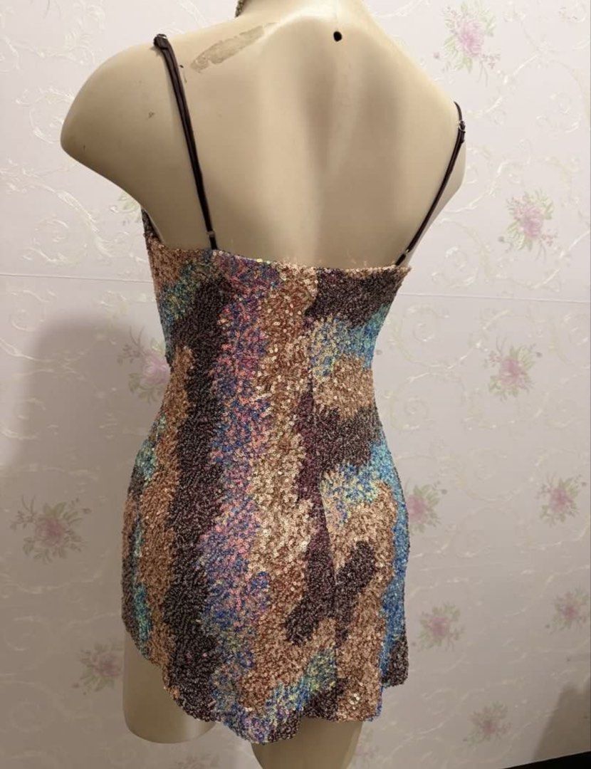 Sequin Cowl Neck Colorful Mini Dress (Category: Dresses) located in Makati City. Submitted by petite_preloved2 (Listing ID 1470742895, Image 2). Description: Can fit xs- semi med Not recommended for girls above 5’2 With unoticeable flaw on the right armit. (Please see last photo).