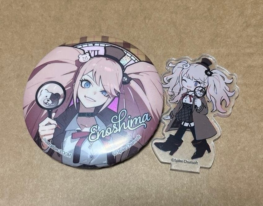 SET: Danganronpa - Junko Enoshima Merch (Category: Character Goods) located in Santa Cruz. Submitted by majaful1997 (Listing ID 1470734440, Image 1). Description: - Set of 2 - Official Danganronpa Merch featuring Enoshima Junko - 1 can badge & 1 acrylic stand (wala pong base) -ETA: DECEMBER 2026.