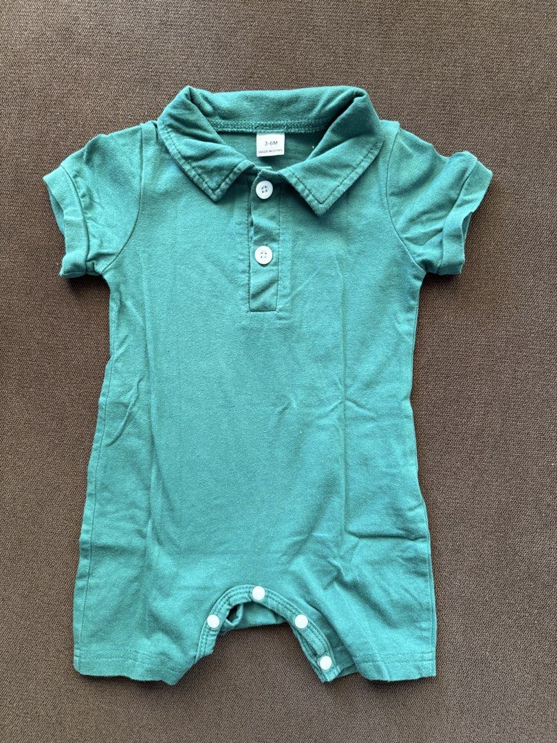 SHEIN Baby Polo Rompers Bundle 3-6M Green Striped Solid (Category: Babies & Kids Fashion) located in Paranaque City. Submitted by trishloren0608 (Listing ID 1470569568, Image 3). Description: - Bundle of 2 baby rompers (Size: 3-6 months) - Designs: 1 dark green & white striped romper, 1 solid dark green romper - Features: Classic polo collar, short sleeves, and button placket - Convenience: Bottom snap buttons for quick and easy diaper changes - 