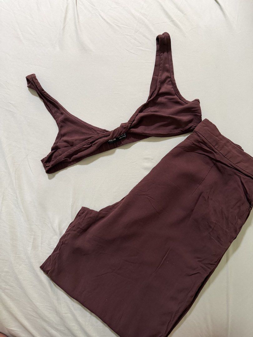 SHEIN Brown Crop Top and Pants Set (Category: Sets or Coordinates) located in Makati City. Submitted by andzr. (Listing ID 1470649656, Image 1). Description: - Brand: SHEIN - Color: Brown - Set includes: Sleeveless crop top with twisted front detail and high-waisted pants - Material: Soft material, breezy.