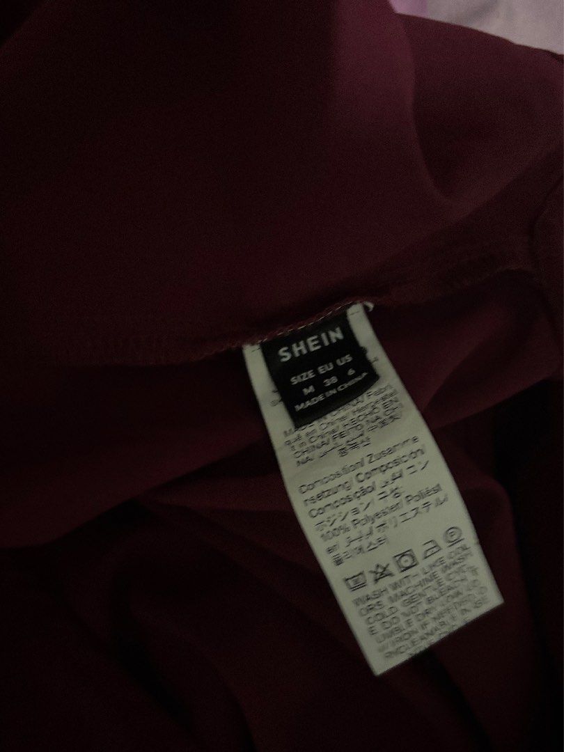 shein burgundy asymmetrical top (Category: Sleeveless) located in Manila. Submitted by iyahpreloved_ (Listing ID 1470700061, Image 3). Description: size M.