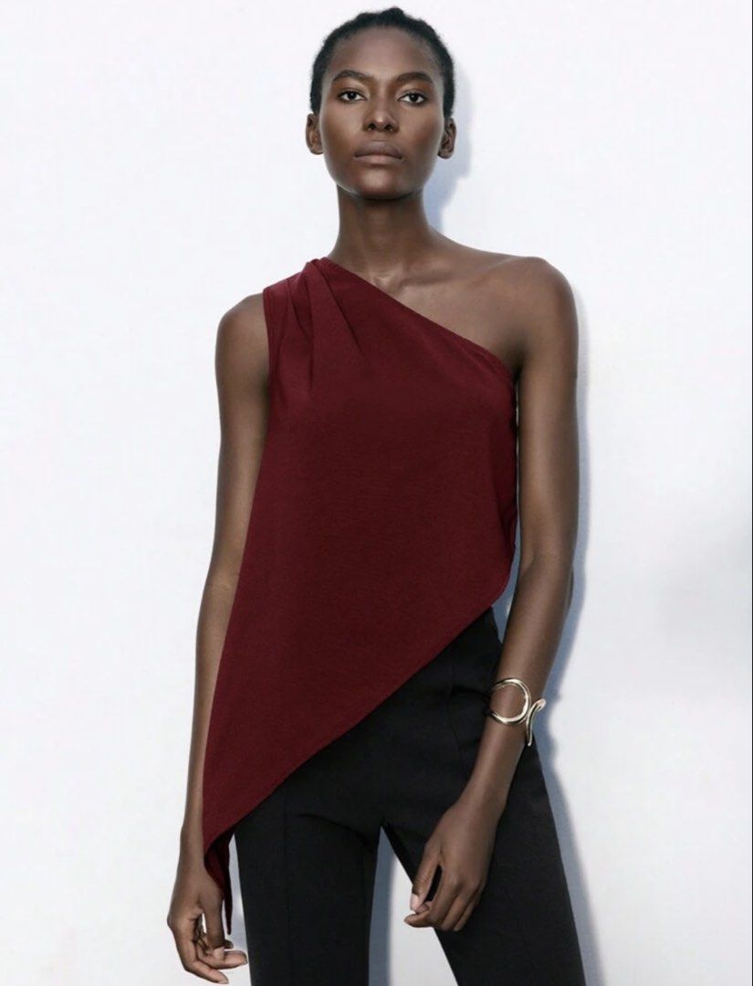 shein burgundy asymmetrical top (Category: Sleeveless) located in Manila. Submitted by iyahpreloved_ (Listing ID 1470700061, Image 1). Description: size M.
