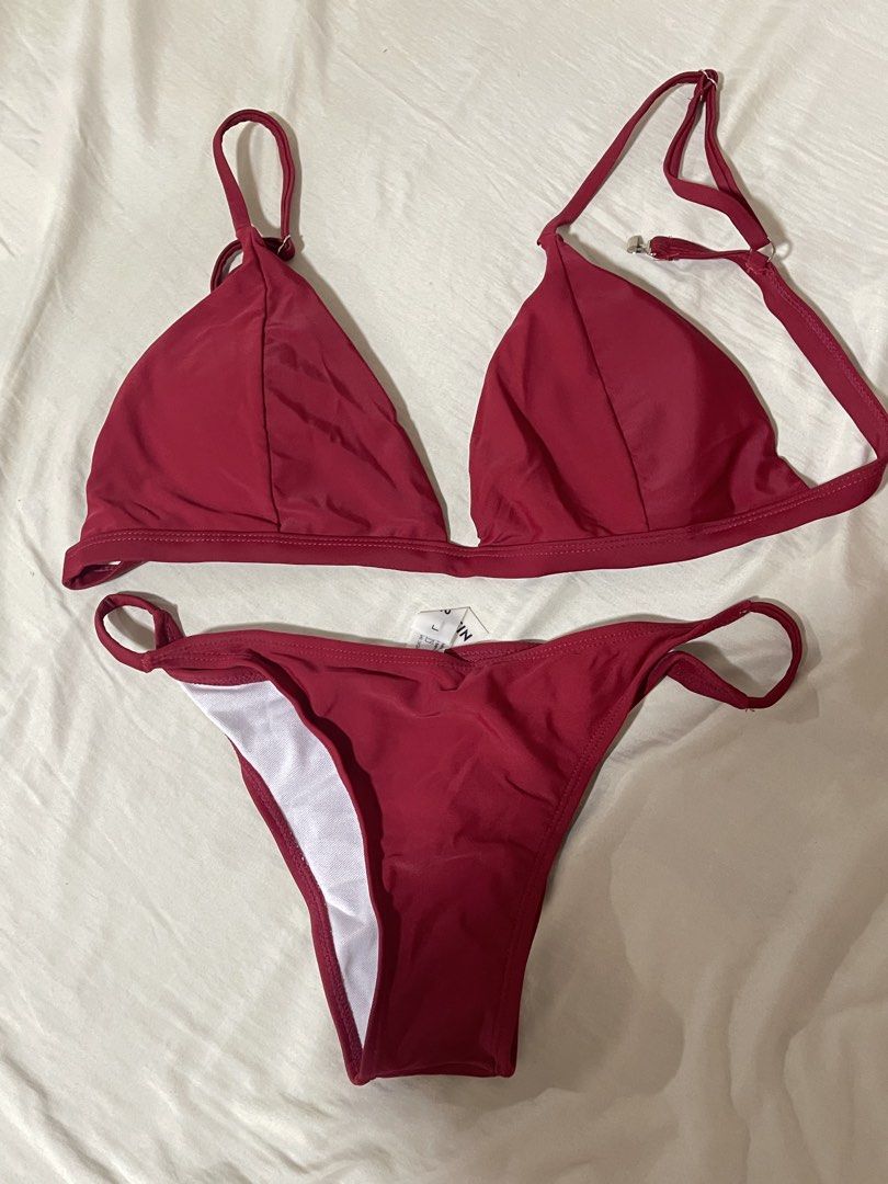 SHEIN Burgundy Triangle Bikini Set Size L (Category: Bikinis & Swimsuits) located in Caloocan City. Submitted by sheshesheshesheshe13 (Listing ID 1470720302, Image 1). Description: - Brand: SHEIN - Color: Burgundy - Size: L (Tag attached) - Condition: Brand new, never worn outdoors (only tried on) - Features: Adjustable straps, side-tie bottoms, and hygiene liner still attached - Material: 80% nylon, 20% spandex.