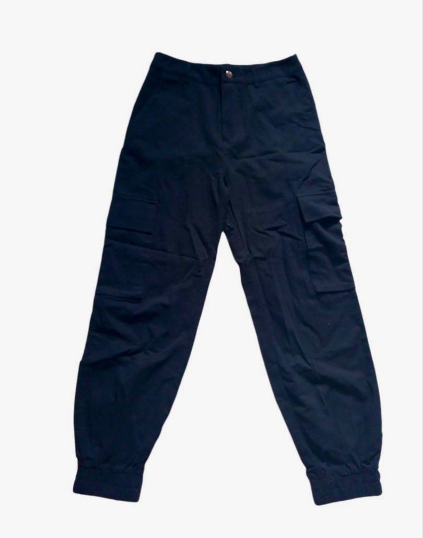 Shein Dark Blue Cargo Pants with Side Pockets and Cuffed Ankles (Category: Other Bottoms) located in Baras. Submitted by vale831 (Listing ID 1470672164, Image 1). Description: - Color: Versatile black - Fit: Relaxed fit for all-day comfort - Pockets: Functional utility pockets on both sides - Cuffs: Trendy elastic ankles - Waist: Secure button closure with belt loops - Style: Standard everyday casual trousers.