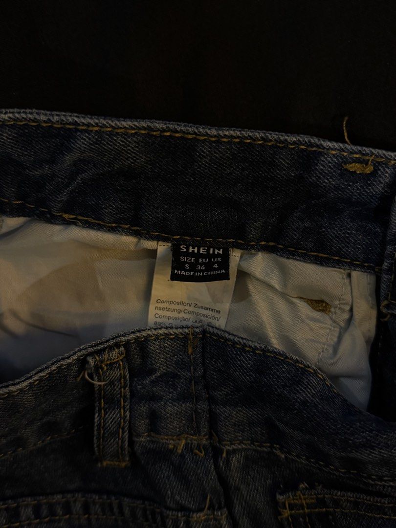 Shein High Waisted Distressed Hem Jeans Size S (Category: Jeans) located in Manila. Submitted by preloved123. (Listing ID 1470715556, Image 3). Description: - Brand: SHEIN - Size: Small (EU 36 / US 4) - Color/Wash: Dark wash denim - Fit: High-waisted with straight wide legs.