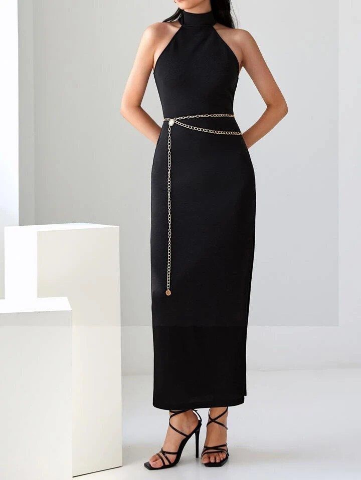 SHEIN Maxi Split Side Halter Dress With Chain Belt (Category: Dresses) located in Quezon City. Submitted by declutteringoodfinds (Listing ID 1470623459, Image 3). Description: Color: Black With slit With belt slot and removable chain belt Stretchable material With Shein pouch RFS: Decluttering impulsive buys.