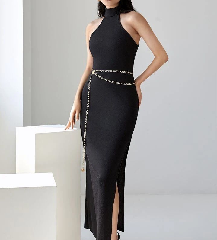 SHEIN Maxi Split Side Halter Dress With Chain Belt (Category: Dresses) located in Quezon City. Submitted by declutteringoodfinds (Listing ID 1470623459, Image 1). Description: Color: Black With slit With belt slot and removable chain belt Stretchable material With Shein pouch RFS: Decluttering impulsive buys.