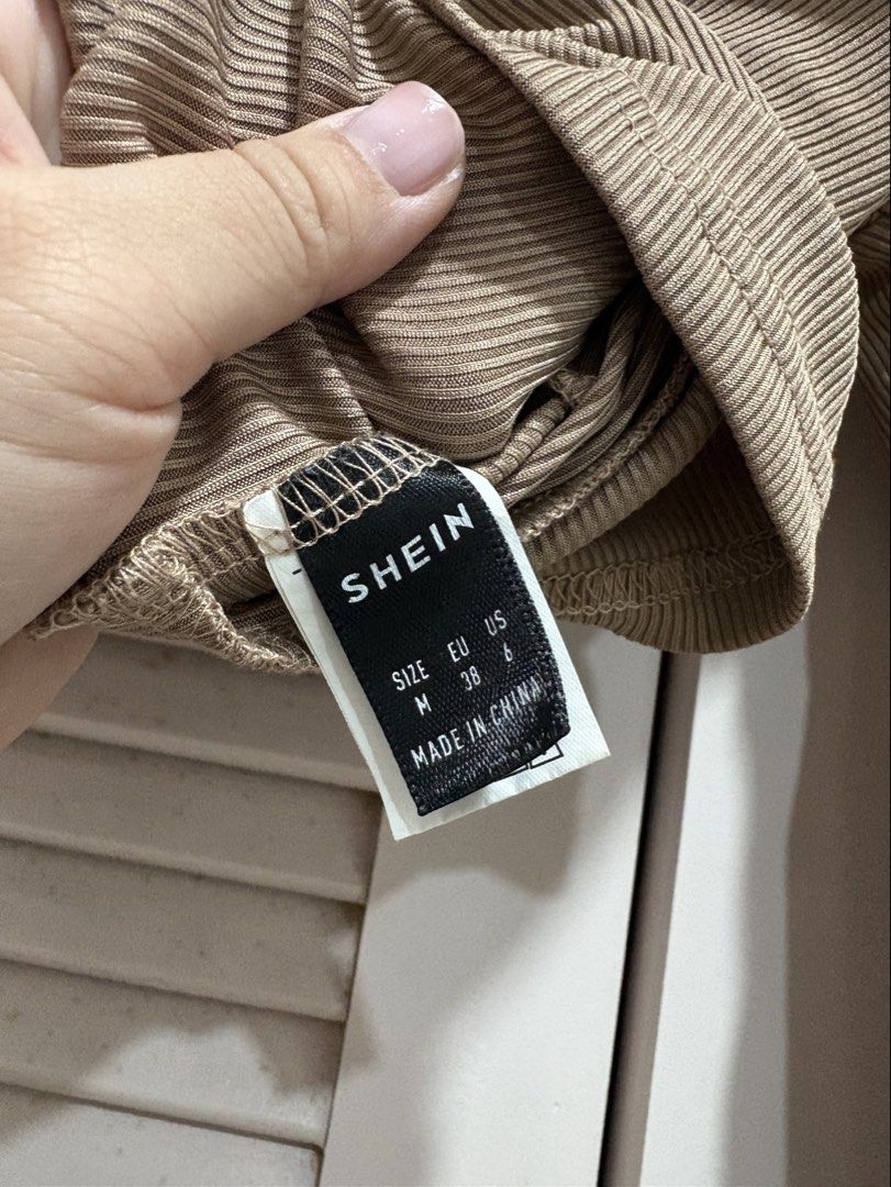 SHEIN Old Rose Ribbed Twist Front Crop Top (Category: Sleeveless) located in Muntinlupa City. Submitted by sukimum (Listing ID 1470670235, Image 3). Description: BNWOT only washed. Was given as a gift, not my style.