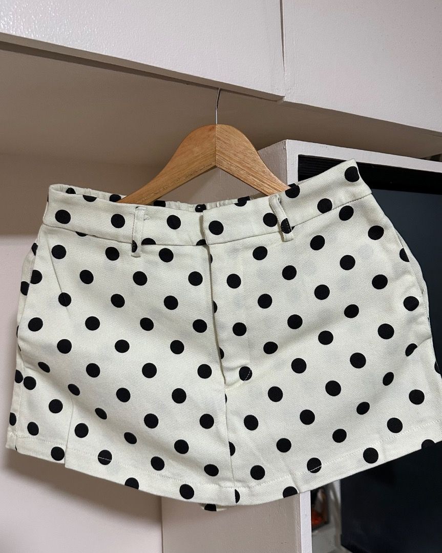 SHEIN Polka Dot Skort (Category: Shorts) located in Caloocan City. Submitted by roanneklarisse (Listing ID 1470741738, Image 1). Description: PRELOVED - Color & Pattern: Cream with black polka dots - Size: Medium (tag attached) - Location: Calamba.