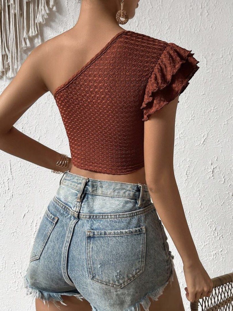 SHEIN VCAY One Shoulder Ruffle Trim Crop Top (Category: Sleeveless) located in Quezon City. Submitted by declutteringoodfinds (Listing ID 1470631580, Image 2). Description: Size: Small Color: Rust Brown With Shein pouch RFS: Decluttering impulsive buys .