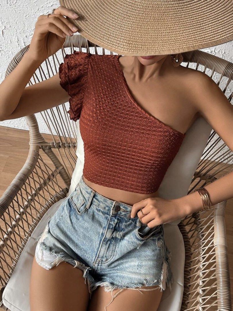 SHEIN VCAY One Shoulder Ruffle Trim Crop Top (Category: Sleeveless) located in Quezon City. Submitted by declutteringoodfinds (Listing ID 1470631580, Image 3). Description: Size: Small Color: Rust Brown With Shein pouch RFS: Decluttering impulsive buys .