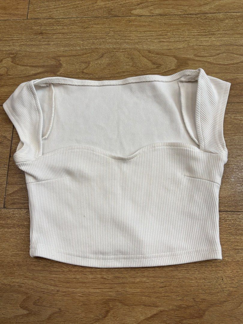 SHEIN White Ribbed Crop Top Size (Category: Sleeveless) located in Manila. Submitted by perwinkle.ph (Listing ID 1470717395, Image 3). Description: - Material: Soft, stretchy ribbed fabric - Design: eSweetheart neckline with cap sleeves .