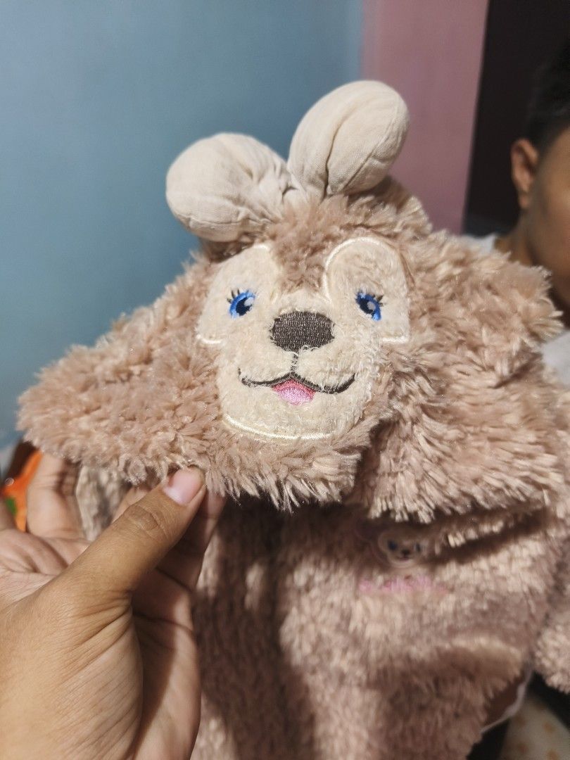 ShellyMay Fuzzy Brown Cape Disney Bear Hooded Jacket (Category: Coats, Jackets and Outerwear) located in Caloocan City. Submitted by mckysprelove (Listing ID 1470564619, Image 3). Description: - Super soft and cozy brown fuzzy cape - Attached hood with embroidered ShellyMay bear face, blue eyes, and pink bow - Embroidered ShellyMay logo patch on the chest - Branded tag attached on the side - Warm fleece material, ideal for Disney trips and theme 
