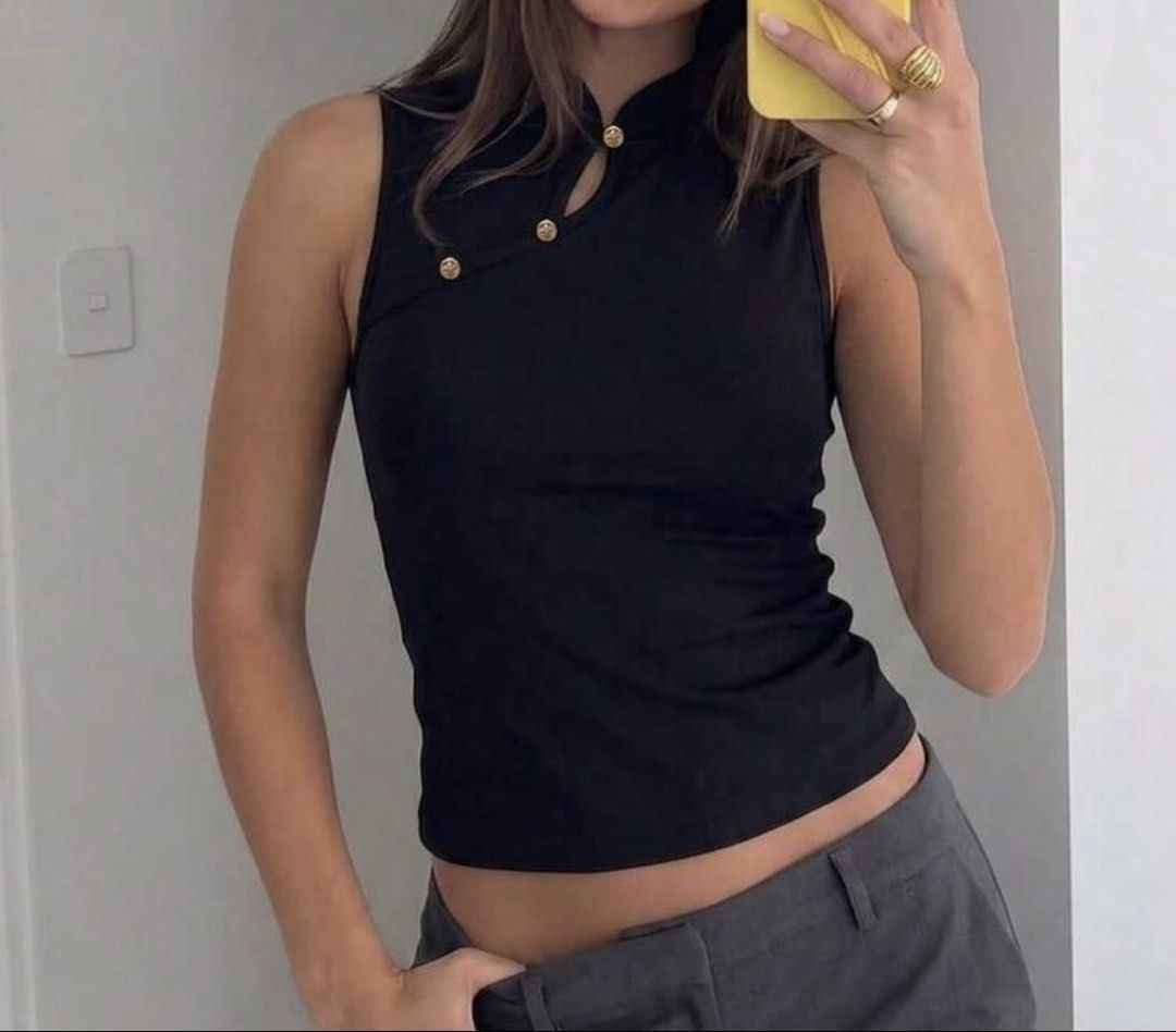 chinese style black top (Category: Sleeveless) located in Manila. Submitted by iyahpreloved_ (Listing ID 1470700356, Image 1). Description: size M used once.