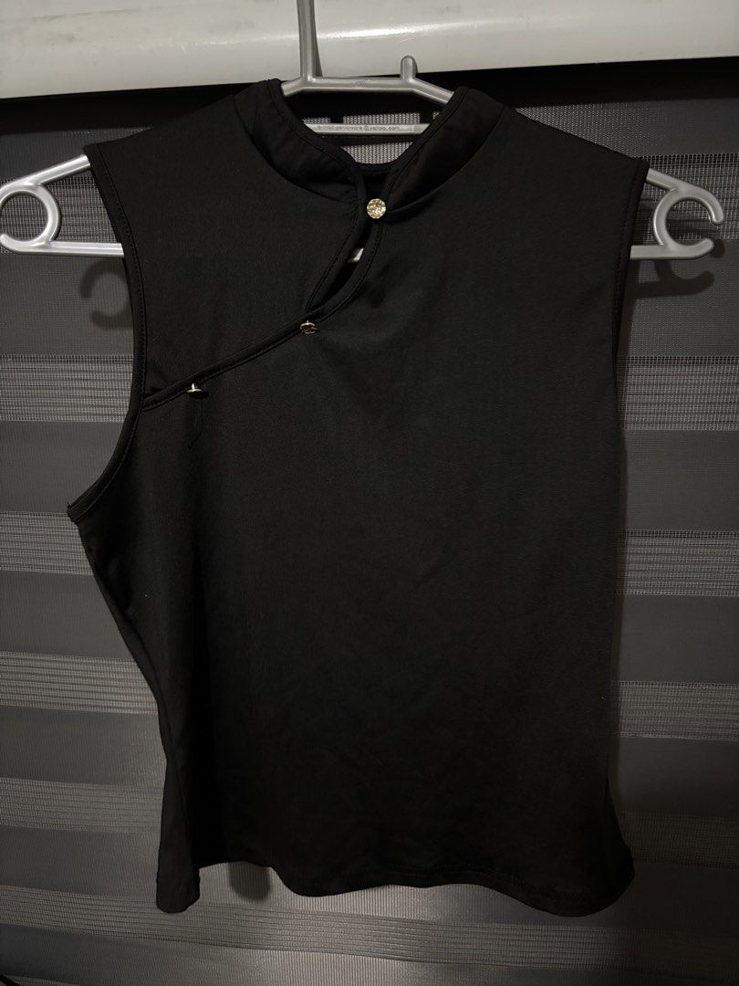 chinese style black top (Category: Sleeveless) located in Manila. Submitted by iyahpreloved_ (Listing ID 1470700356, Image 2). Description: size M used once.