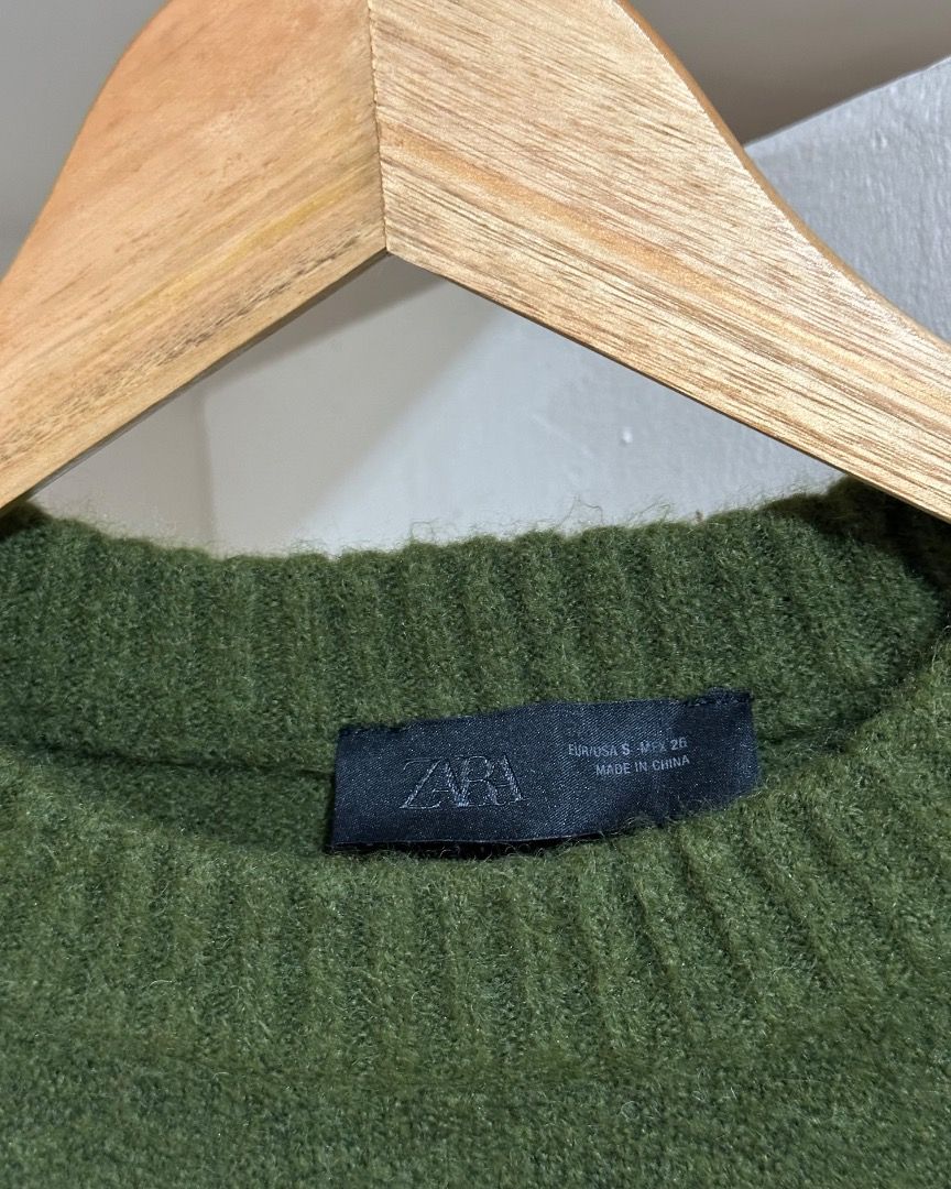 Short sleeve knit sweater (Category: Shirts) located in Caloocan City. Submitted by roanneklarisse (Listing ID 1470741302, Image 2). Description: PRELOVED - Brand: Zara - Material: Soft, cozy knit material - Details: Ribbed cuffs and hem - Location: Calamba.