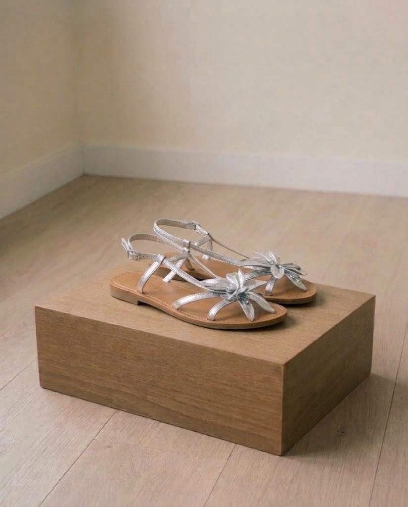 SILVER LEATHER SANDALS FLATS US 5.5 6 (Category: Flats & Sandals) located in Marikina City. Submitted by minimalistmanila (Listing ID 1470643402, Image 1). Description: Silver leather sandals, fits US 5.5 to US 6 size. Bought from London. Order now!.