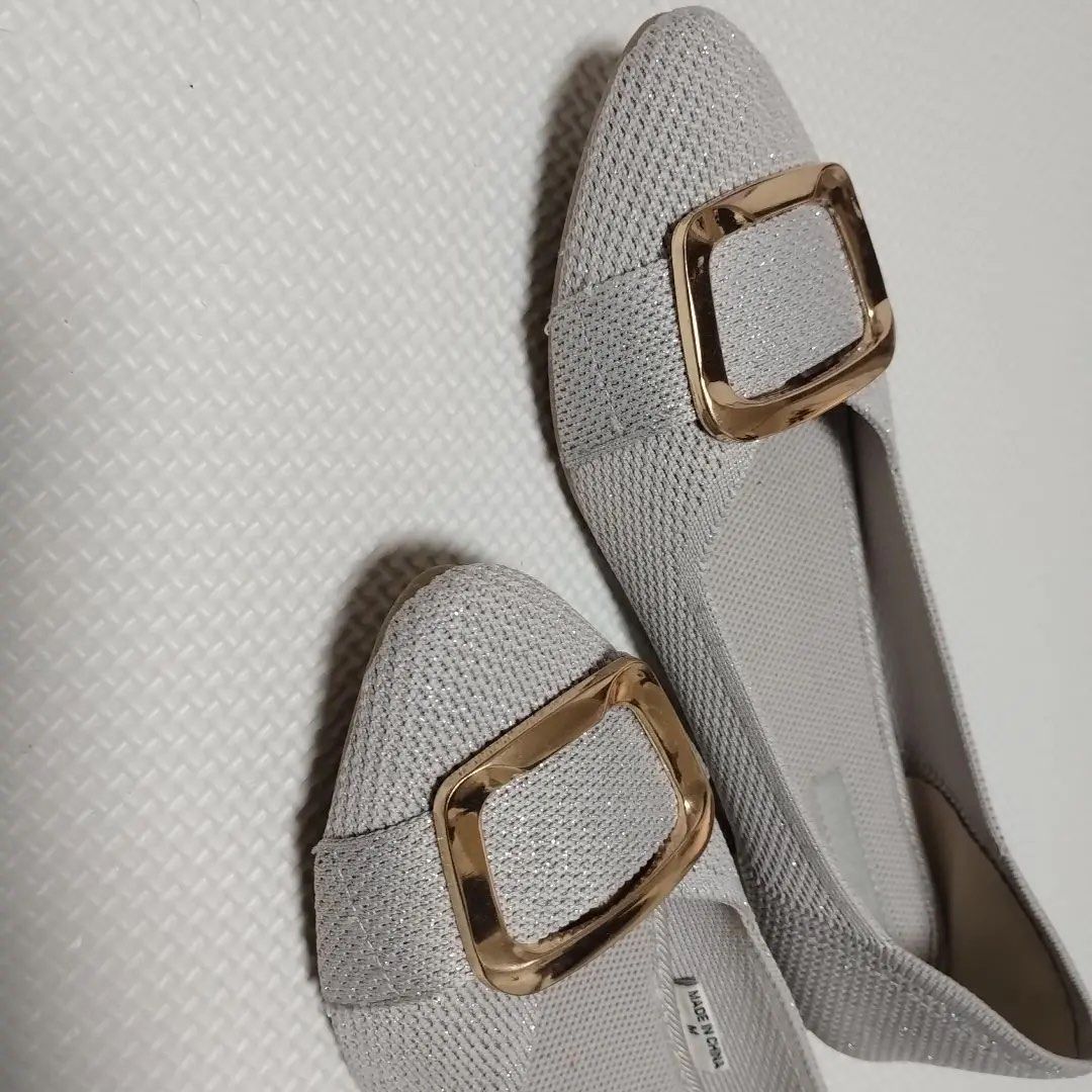 Silver Pointed Toe Flats with Gold Buckle (Category: Flats & Sandals) located in Manila. Submitted by alyanarein (Listing ID 1470684916, Image 2). Description: - Style: Silver knitted pointed-toe flats with a statement large square gold buckle - Material: Soft textured fabric, comfortable slip-on design for everyday wear - Size: Size M (Made in China tag inside) - Condition: Clean and ready to wear.