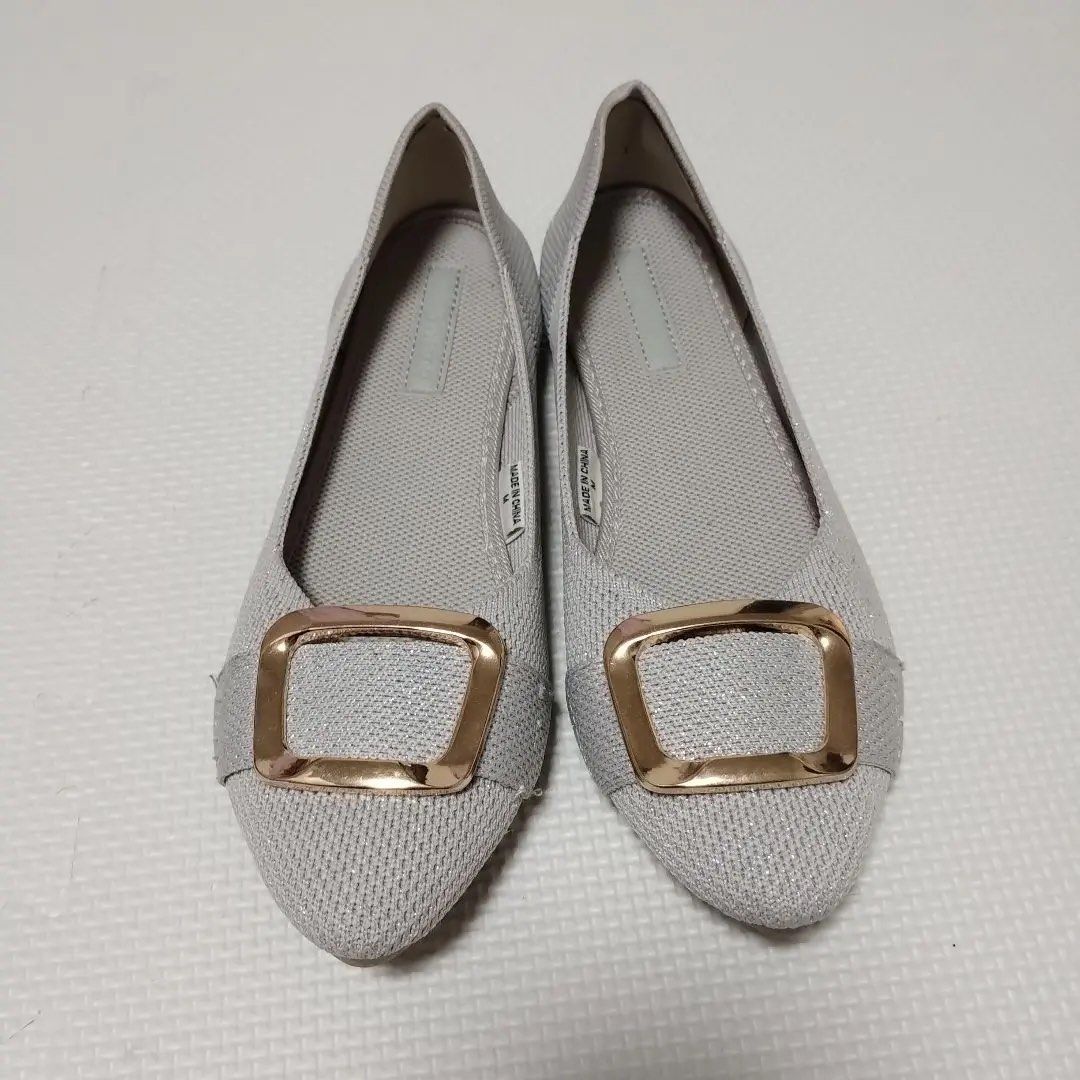 Silver Pointed Toe Flats with Gold Buckle (Category: Flats & Sandals) located in Manila. Submitted by alyanarein (Listing ID 1470684916, Image 1). Description: - Style: Silver knitted pointed-toe flats with a statement large square gold buckle - Material: Soft textured fabric, comfortable slip-on design for everyday wear - Size: Size M (Made in China tag inside) - Condition: Clean and ready to wear.