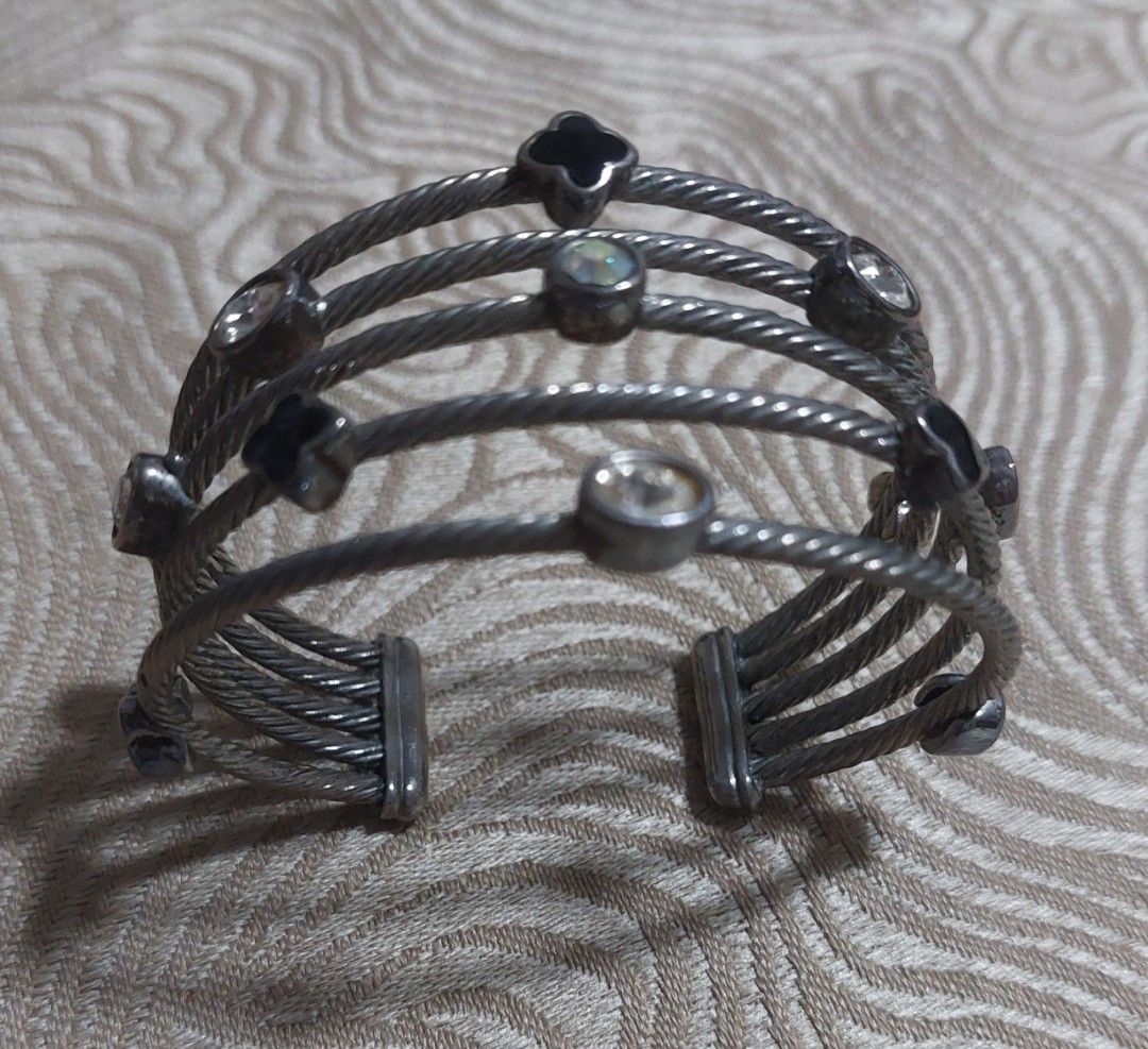 Silver tone multi row cuff bracelet (Category: Rings) located in Camaligan. Submitted by timeless-trinkets (Listing ID 1470584469, Image 3). Description: I saw this design similar to David Yurman jewelry 😍 No flaws non tarnish vintage design.