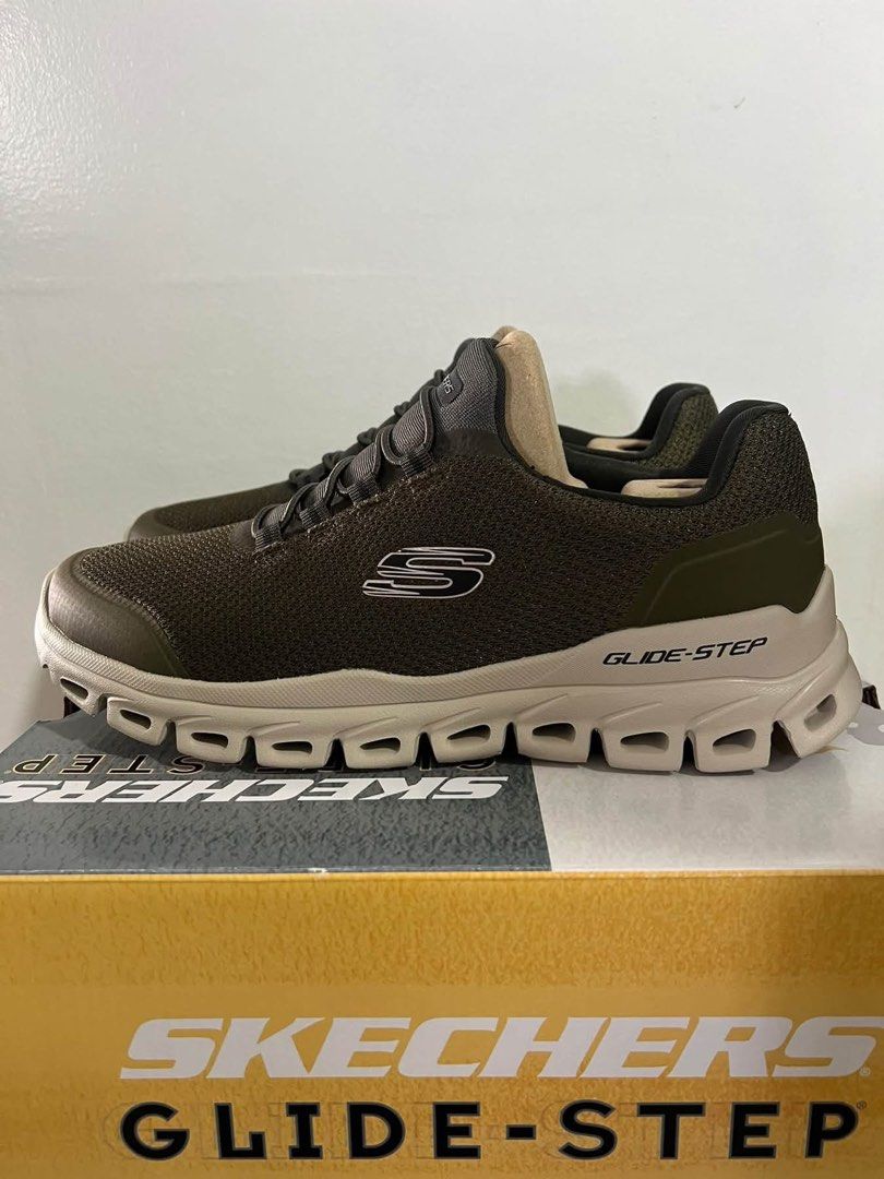 Skechers Glide-Step Sneakers Olive Green (Category: Sneakers) located in Baguio. Submitted by heath2600 (Listing ID 1470589806, Image 1). Description: - Brand: Skechers Glide-Step - Color: Olive green and beige - Condition: Brand new, unworn, comes with original shoebox - Sole: Geometric cushioned sole for extra bounce and comfort - Upper: Breathable mesh with secure lace-up closure - Perfect for walking, working out, or everyday casual wear - Av
